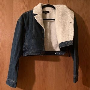 Cropped denim jacket with Sherpa lining. Large. NWT